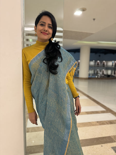 Handwoven linen blue saree with woven sitara