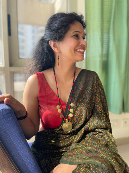 Ajrakh naturally dyed cotton silk saree with hand embroidery