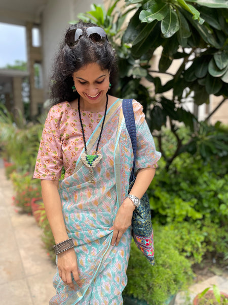 Pastel shade soft kota doria cotton saree with zari border- booti design