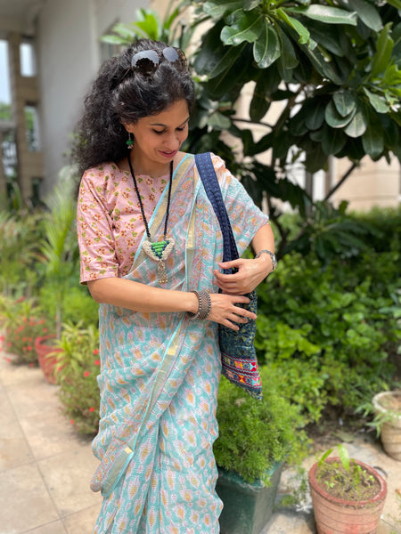 Pastel shade soft kota doria cotton saree with zari border- booti design