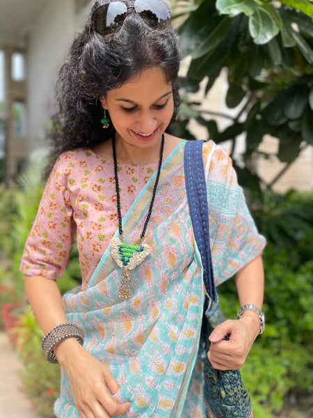 Pastel shade soft kota doria cotton saree with zari border- booti design