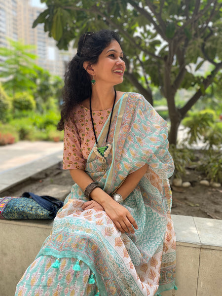 Pastel shade soft kota doria cotton saree with zari border- booti design