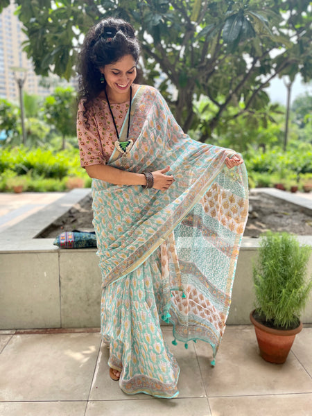 Pastel shade soft kota doria cotton saree with zari border- booti design