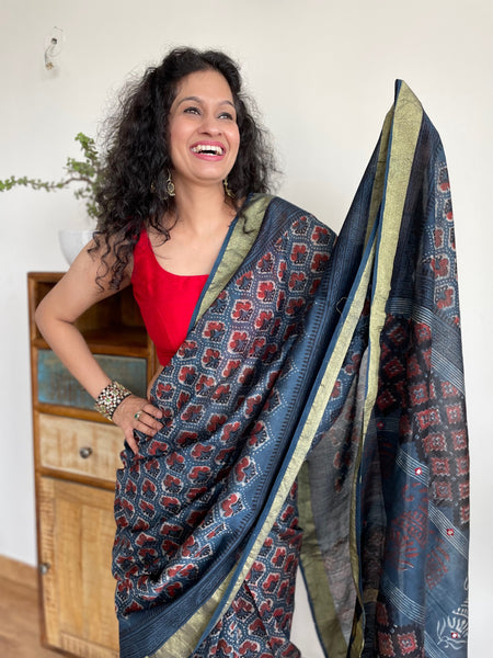 Patela border cotton silk hand block printed dabu saree with sitara embroidery.