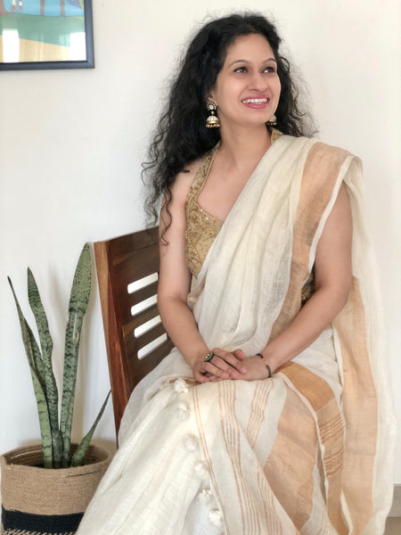 White with broad 4 inch golden zari - Handwoven Linen Saree