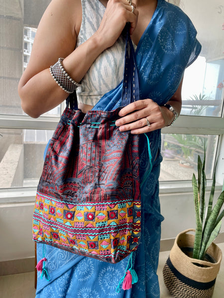 Ajrakh blockprinted Mashru Silk Embroidered Potli Style Bag