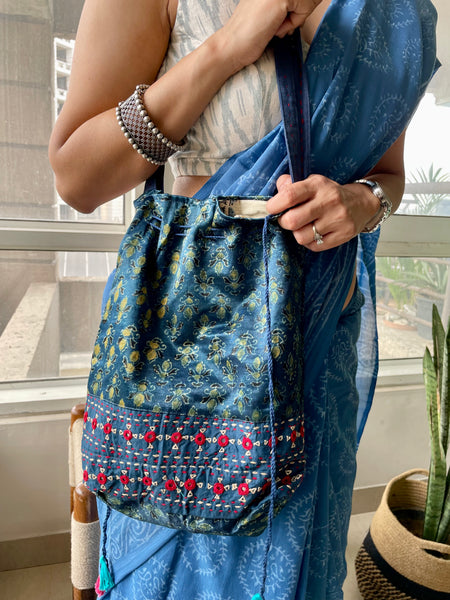 Ajrakh blockprinted Mashru Silk Embroidered Potli Style Bag