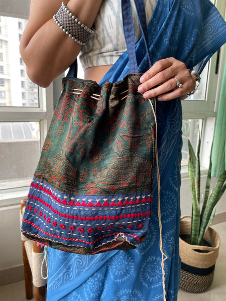 Ajrakh blockprinted Mashru Silk Embroidered Potli Style Bag