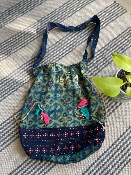 Ajrakh blockprinted Mashru Silk Embroidered Potli Style Bag