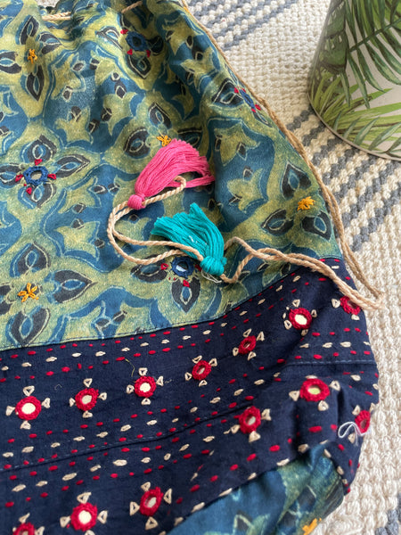 Ajrakh blockprinted Mashru Silk Embroidered Potli Style Bag