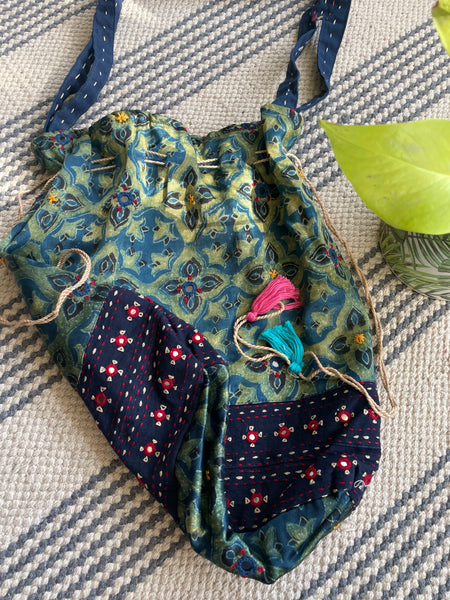 Ajrakh blockprinted Mashru Silk Embroidered Potli Style Bag