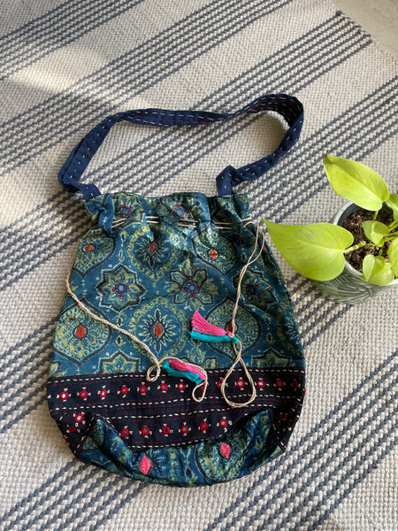 Ajrakh blockprinted Mashru Silk Embroidered Potli Style Bag
