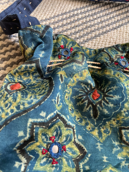 Ajrakh blockprinted Mashru Silk Embroidered Potli Style Bag