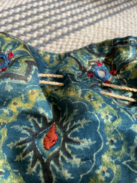 Ajrakh blockprinted Mashru Silk Embroidered Potli Style Bag