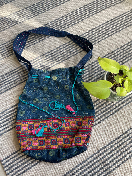 Ajrakh blockprinted Mashru Silk Embroidered Potli Style Bag