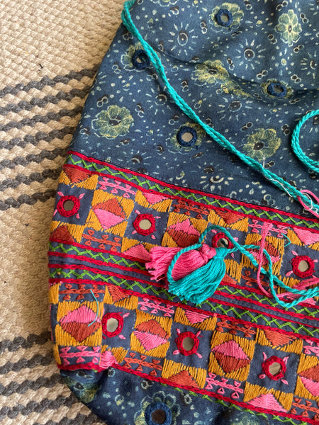 Ajrakh blockprinted Mashru Silk Embroidered Potli Style Bag