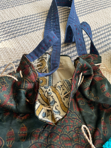 Ajrakh blockprinted Mashru Silk Embroidered Potli Style Bag