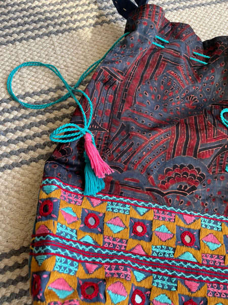 Ajrakh blockprinted Mashru Silk Embroidered Potli Style Bag