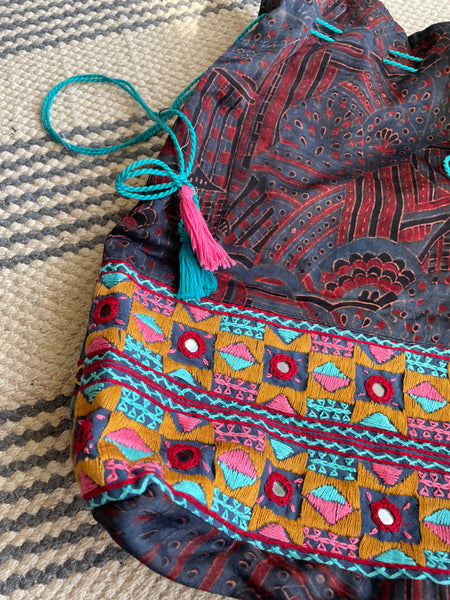 Ajrakh blockprinted Mashru Silk Embroidered Potli Style Bag