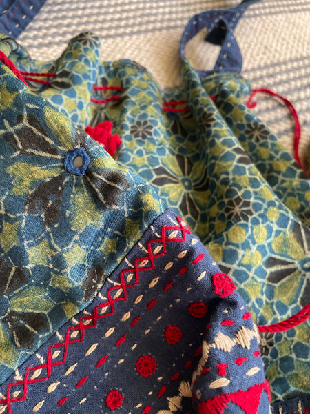 Ajrakh blockprinted Mashru Silk Embroidered Potli Style Bag