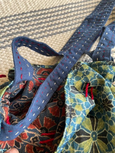 Ajrakh blockprinted Mashru Silk Embroidered Potli Style Bag