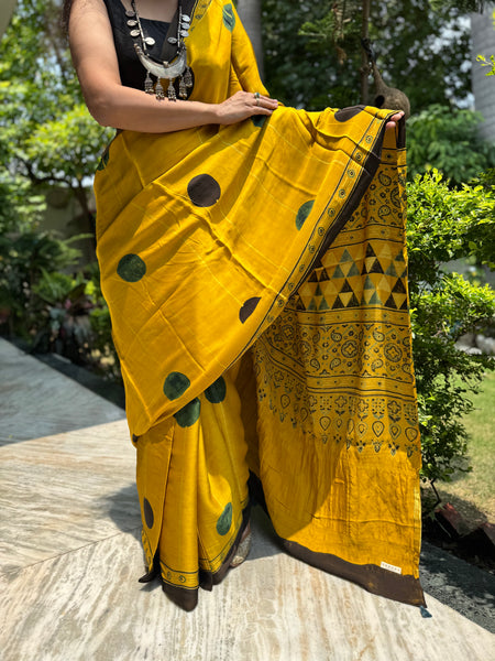 Ajrakh naturally dyed modal silk saree with zari border pallu
