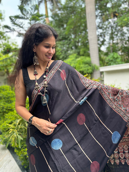 Ajrakh naturally dyed modal silk saree with zari border pallu