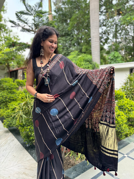 Ajrakh naturally dyed modal silk saree with zari border pallu
