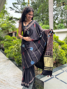 Ajrakh naturally dyed modal silk saree with zari border pallu