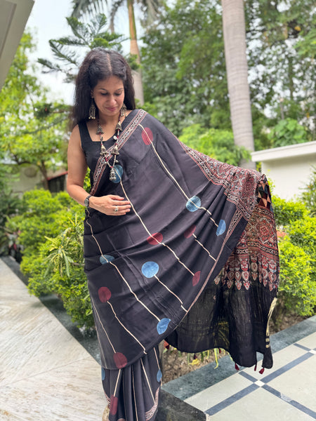 Ajrakh naturally dyed modal silk saree with zari border pallu