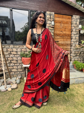 Ajrakh naturally dyed modal silk saree with zari border pallu