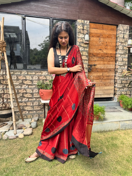 Ajrakh naturally dyed modal silk saree with zari border pallu