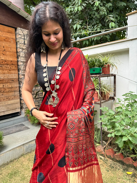 Ajrakh naturally dyed modal silk saree with zari border pallu