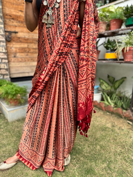Ajrakh naturally dyed modal silk saree with embroidered pallu