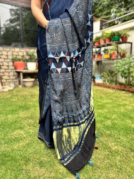 Ajrakh naturally dyed modal silk saree with zari border pallu