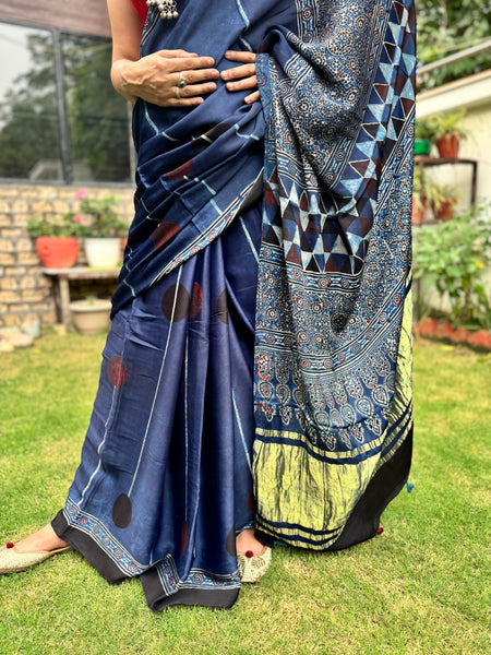 Ajrakh naturally dyed modal silk saree with zari border pallu