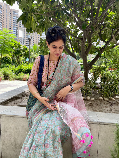 Pastel shade soft kota doria cotton saree with zari border- floral design