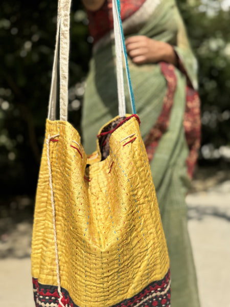 Ajrakh blockprinted Mashru Silk Embroidered Potli Style Bag