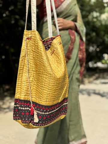 Ajrakh blockprinted Mashru Silk Embroidered Potli Style Bag