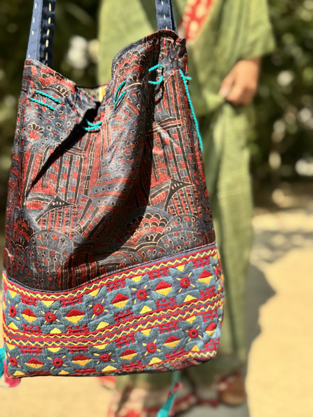 Ajrakh blockprinted Mashru Silk Embroidered Potli Style Bag