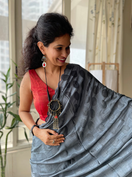 Modal voile self designed grey saree- with pure silk black BP