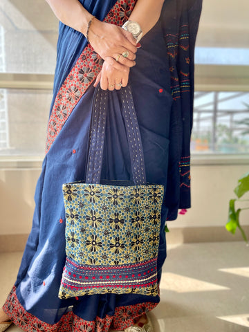 Ajrakh blockprinted Mashroo Silk Embroidered Jhola