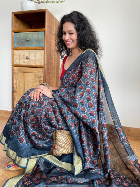 Patela border cotton silk hand block printed dabu saree with sitara embroidery.