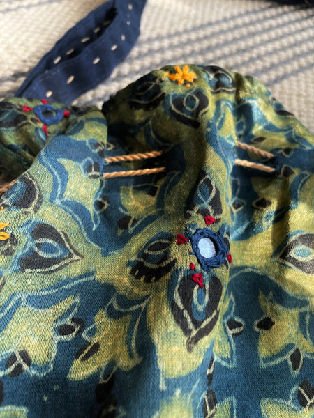 Ajrakh blockprinted Mashru Silk Embroidered Potli Style Bag